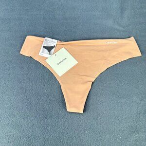 Calvin Klein Invisibles Womens Size Medium Panty Thong Micro Stretch Beige New